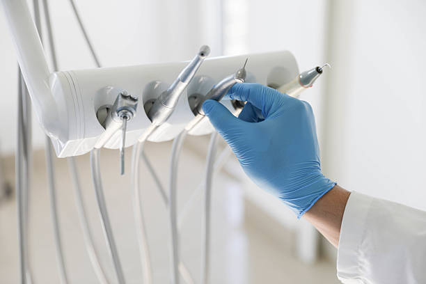 Professional Dental Crowns And Bridges technician working in West Bay Shore, NY